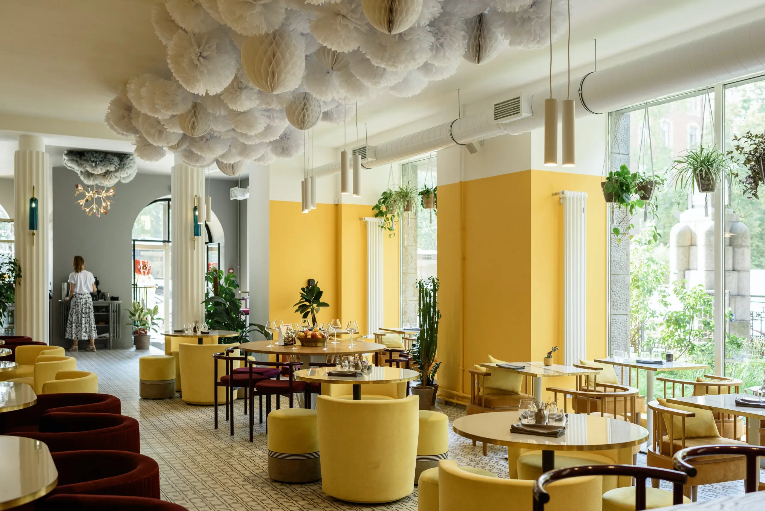 Restaurant Contract Furniture with yellow lounge seating and yellow and white walls.