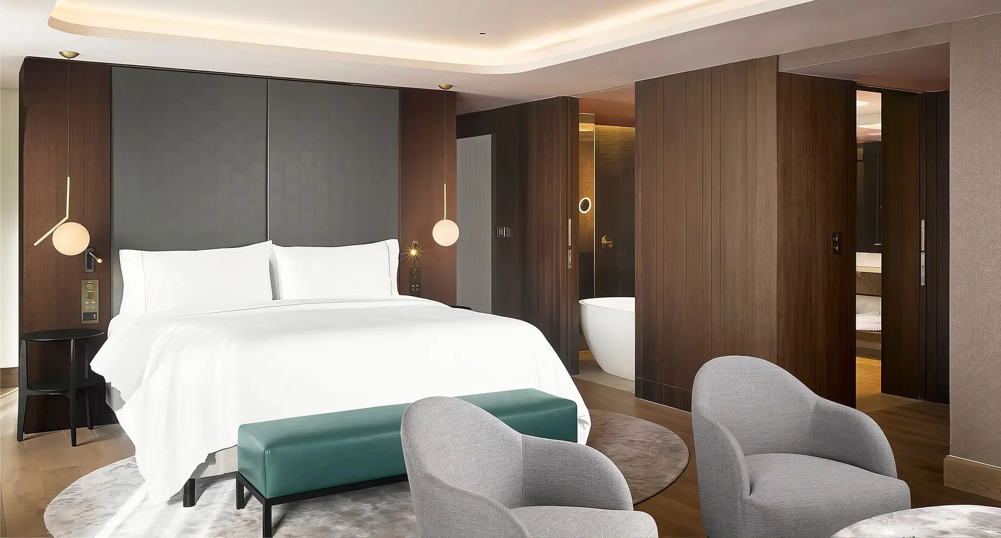 An elegantly designed hotel room adorned with a plush bed, a stylish chair, and a sleek television, located at THE WESTIN LONDON CITY.